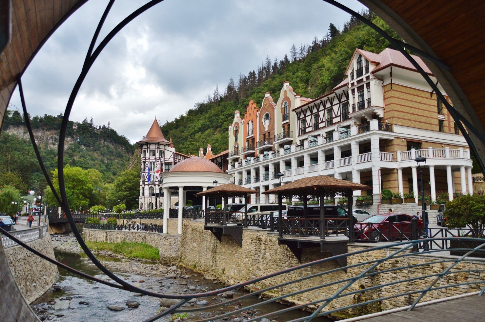 View of Crowne Plaza Hotel from the twisted bridge over the Borjomula River