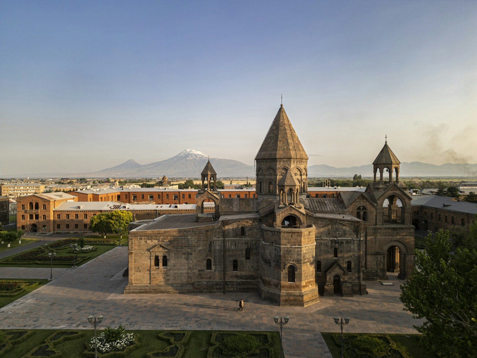 Exterior of Echmiadzin Cathedral surrounded by gardens