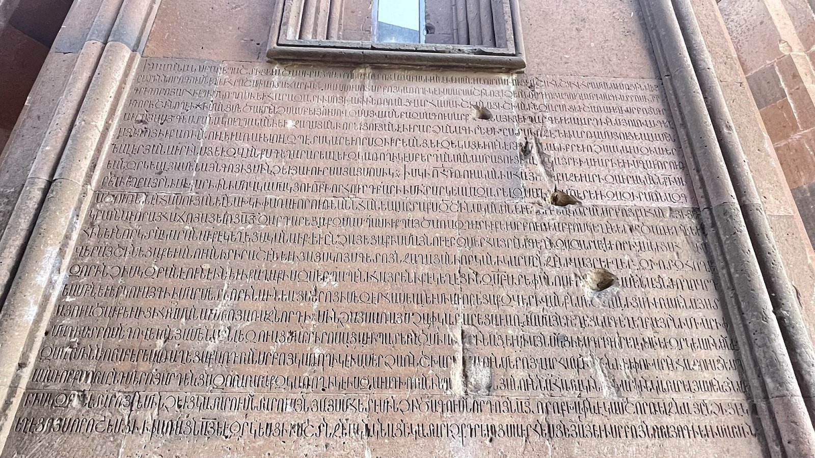 Main church of Marmashen with drum dome and pink tuff, Armenia