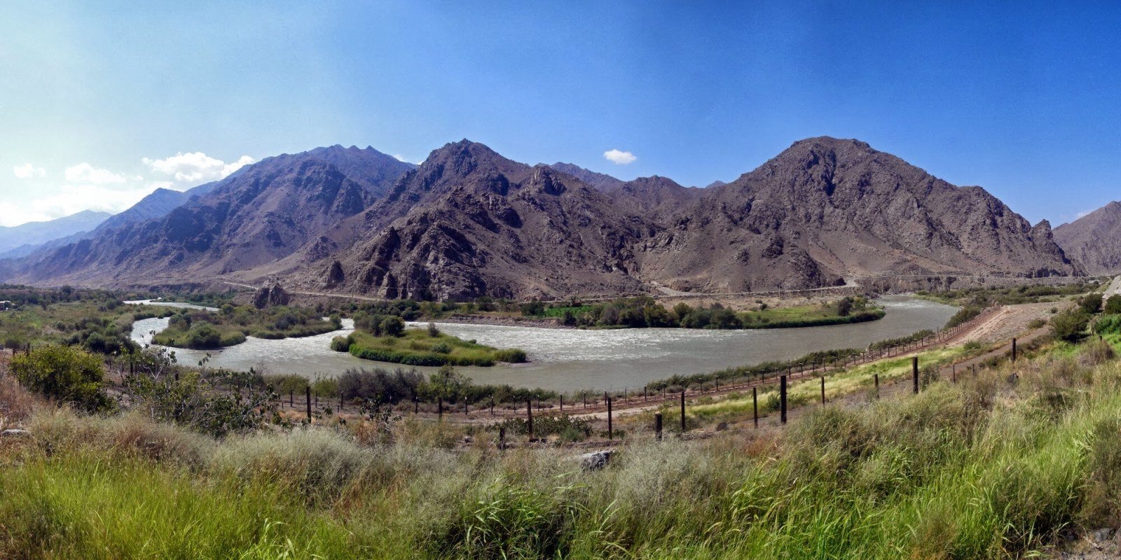 View of the historic centre of Meghri with slate rooftops and pomegranate trees