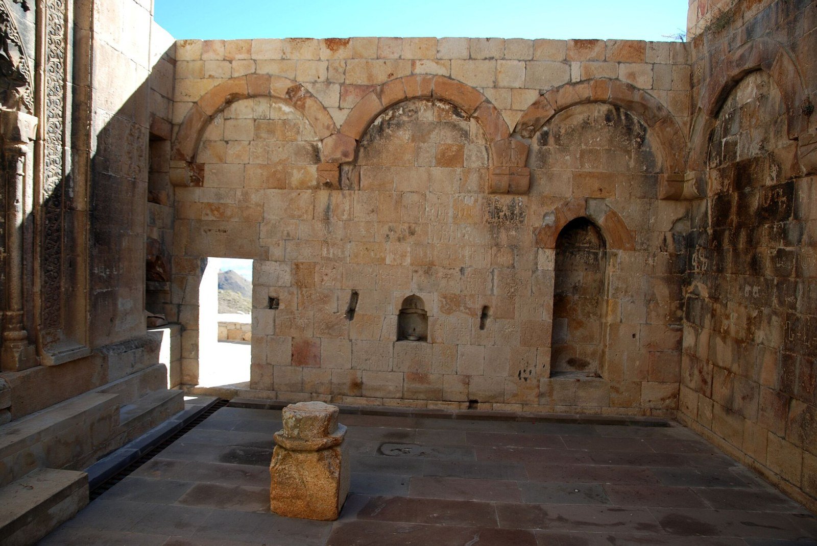 13th-century khachkars on the exterior wall of Spitakavor Monastery